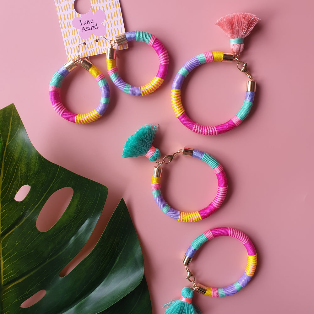 Handmade tassel bracelet crafted from vibrant coloured cords, designed to be lightweight and comfortable.